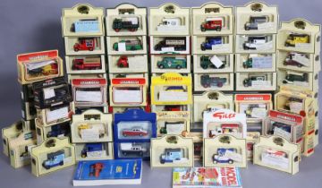 Approximately forty various Lledo die-cast scale model vehicles, each with a window box.