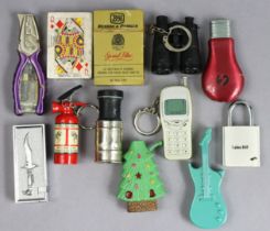 Twelve various novelty cigarette lighters.