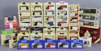 Approximately forty various scale model vehicles by Lledo & others, each with a window box.