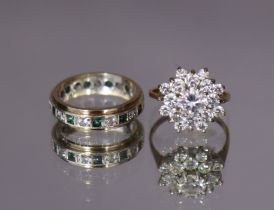 A yellow metal eternity ring set alternate green & white stones, size: K (3.2gm); & a 9ct. gold ring
