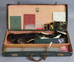 Three archery bows, with cases; & various other archery accessories.