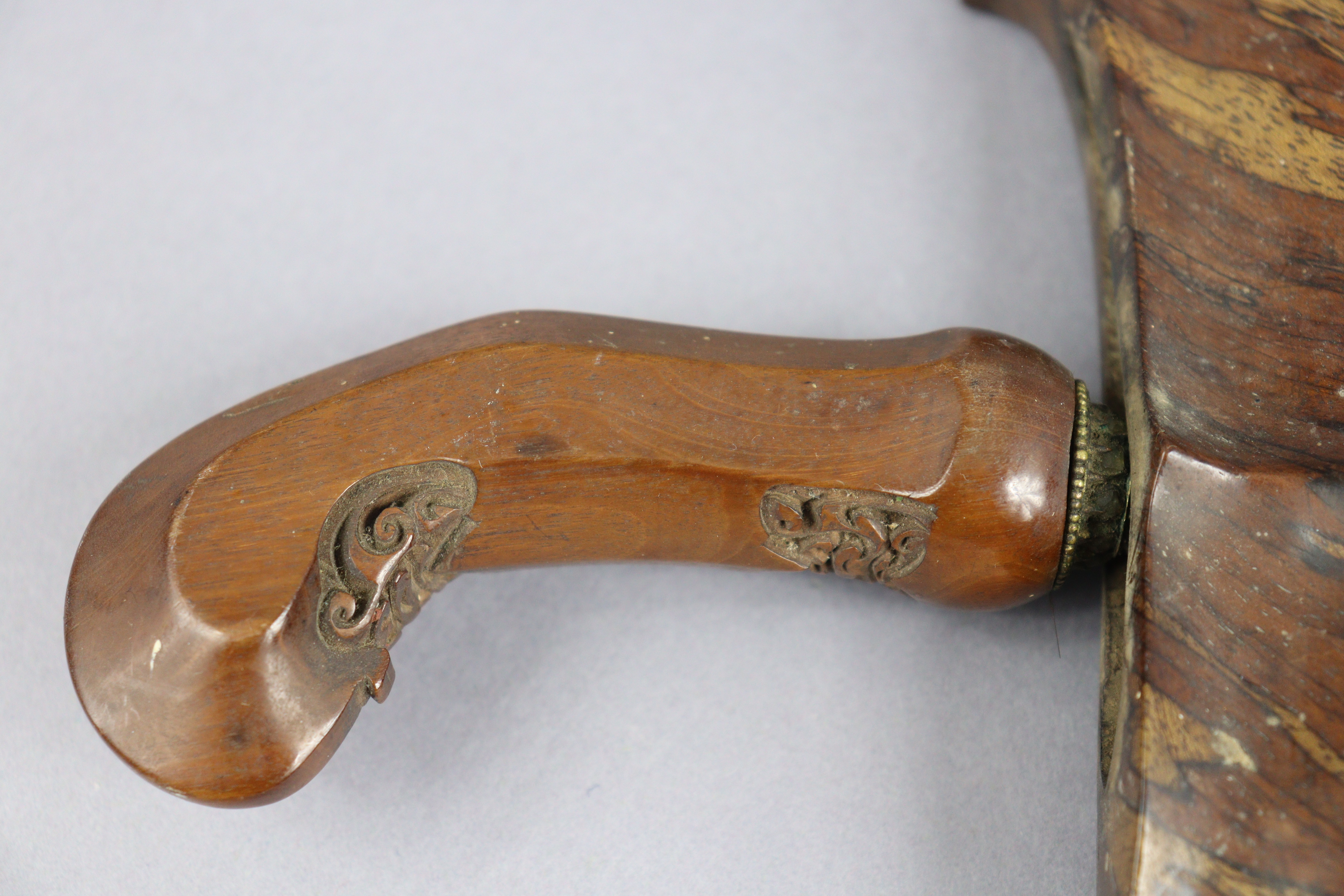 An Indonesian Kris having a 33.5cm long wavy blade, carved wooden grip, & with a metal-covered - Image 3 of 7