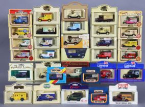 Approximately sixty various die-cast scale model vehicles by Matchbox, Lledo, and others, all