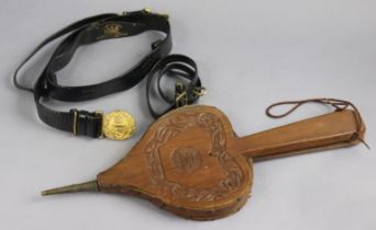 A Royal Navy officers black leather dress belt with a gilt-metal clasp; & a pair of carved