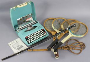 An ebonised gent’s walking cane with a silver handle, four Slazenger wooden tennis rackets; a cane