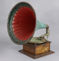 A vintage-style oak-cased table-top gramophone with a painted & fluted 48.25cm diameter metal horn.