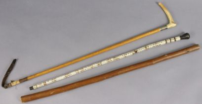 A 19th century whale-bone walking cane, 56cm high; a riding crop; & a officer’s stick.