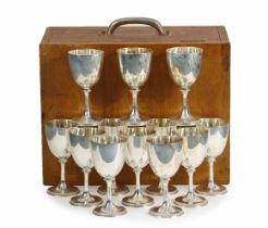 A SET OF TWELVE STERLING SILVER GOBLETS, each with beaded edge to the flared stem & circular foot,