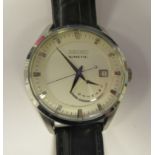 A Seiko stainless steel cased wristwatch, the movement with subsidiary seconds, faced by a baton