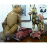 Toys: to include a moulded resin hobby-horse on wheels  21"h