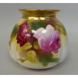 A Royal Worcester china bag design vase, decorated with roses and gilt  bears the signature '