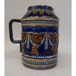 A late Victorian Doulton Lambeth stoneware, cylindrical jug with a tapered and upstand rim,