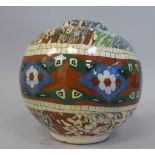 A Vallauris pottery spherical vase, decorated in colours with varying designs  bears impressed mark