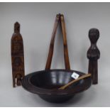 Treen and other wooden artefacts: to include a pair of folding butter pats; and a turned elm bowl