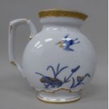 A William Brownfield china jug of moonflask design, decorated by Christopher Dresser with Japanese