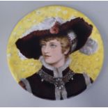 A late 19thC porcelain plate, decorated with a head and shoulders portrait, a young lady wearing a