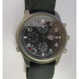 A Myota, Land Rover titanium cased wristwatch, the movement faced by a black dial with sweeping