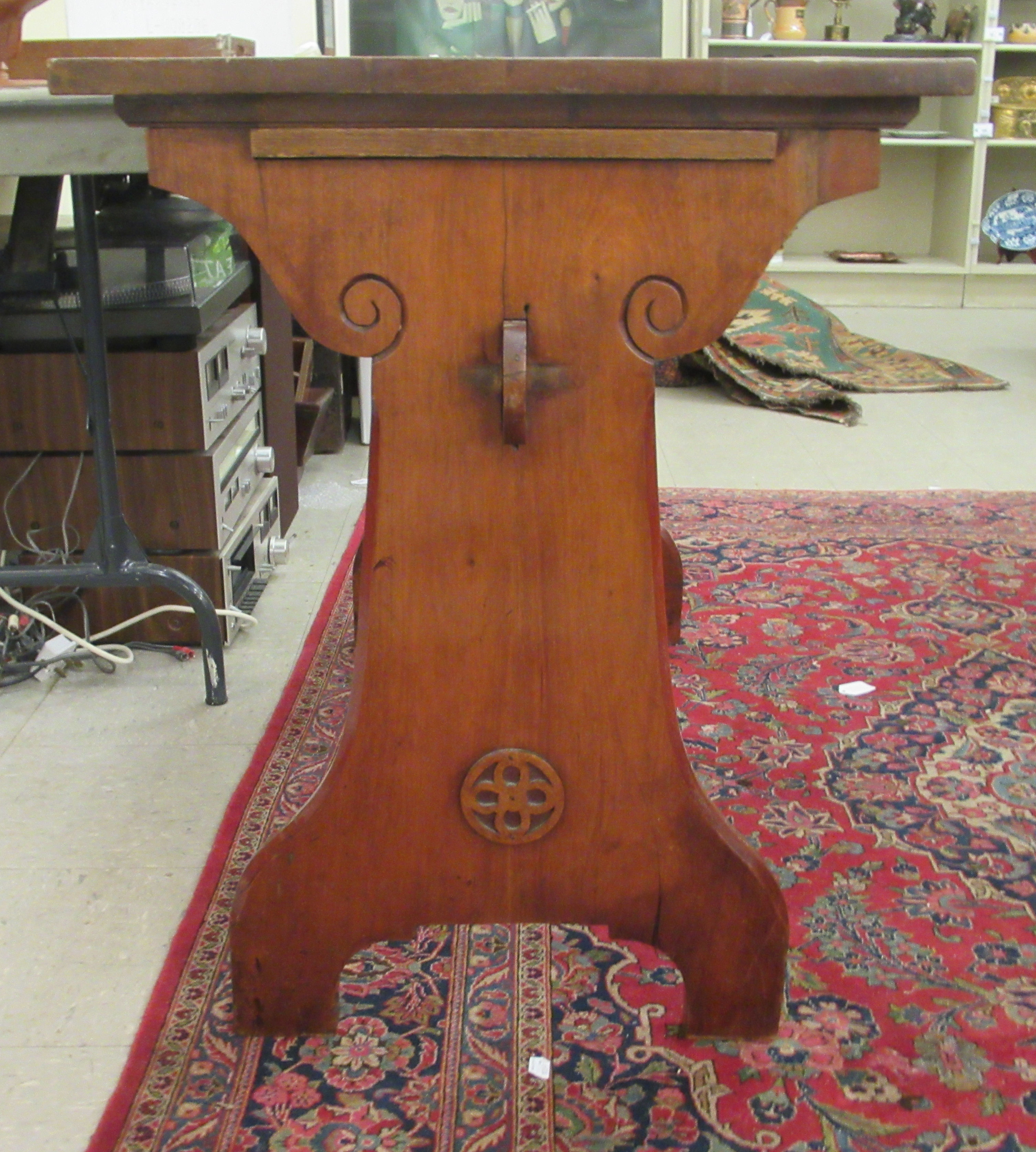 A late Victorian Gothic inspired mahogany hall table, raised on planted ends  30"h  42"w - Image 3 of 4