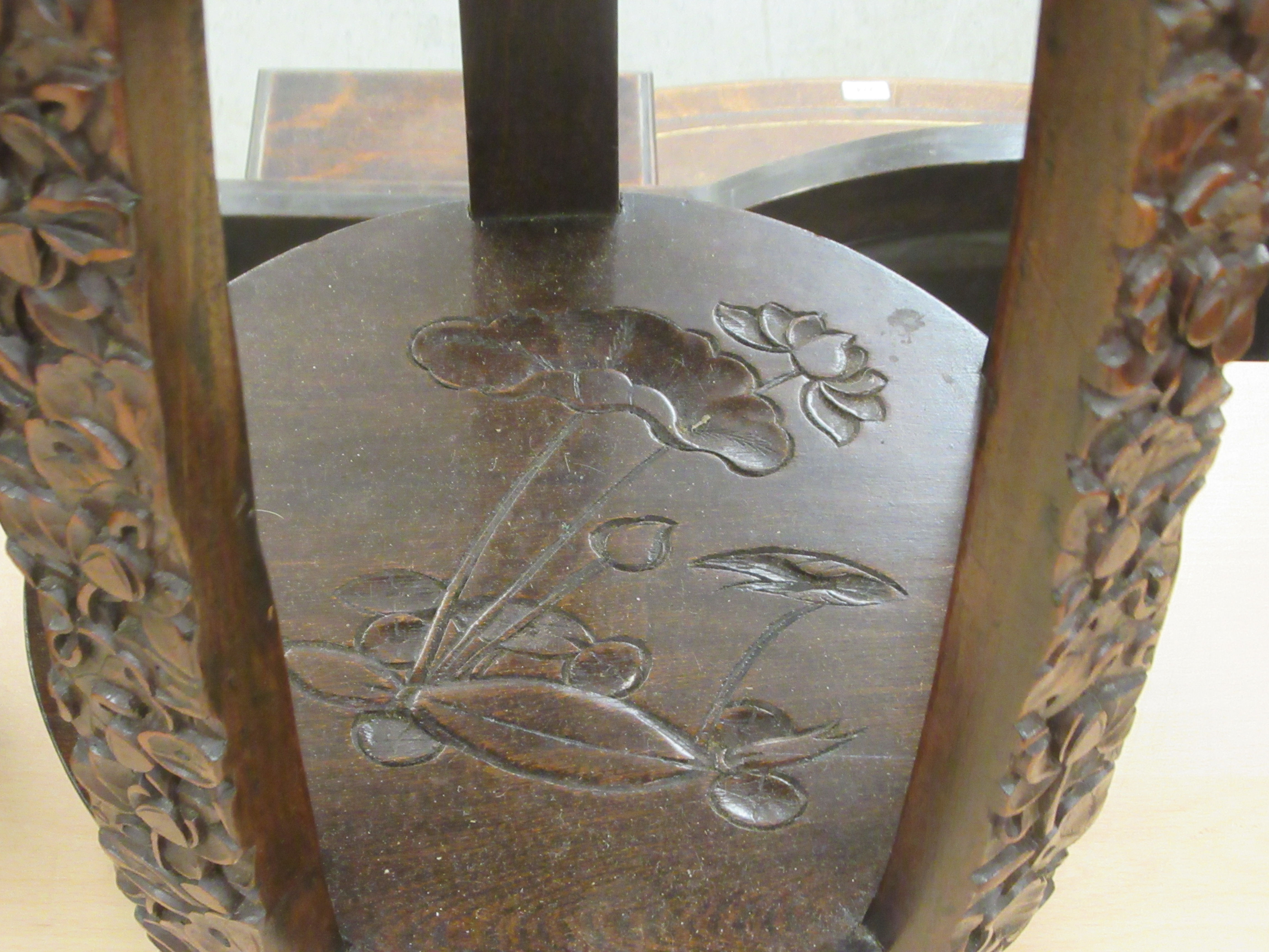 A pair of 20thC Japanese barrel design garden seats, profusely carved and densely decorated with - Image 4 of 5