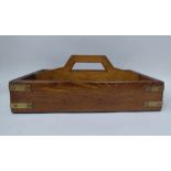 A 19thC light oak cutlery tray with a central division and cut-out handle  15"w