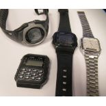 Four dissimilar Casio wristwatches, viz. one with a quartz movement, faced by a baton dial;