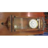 A late 19th/early 20thC The Hamburg American Clock Company, painted rosewood cased wall clock with