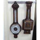 Two similar 1920/30s oak framed barometers, each with an Arabic dial  31"h