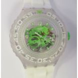 A Swatch Scuba Chloropish wristwatch, faced by an Arabic and baton dial