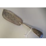 A George IV silver fiddle pattern fish slice with a decoratively pierced, curved blade  London 1827