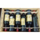 A case of twelve bottles of 1975 Chateau Ducru Beaucaillou Saint Julien Medoc wine, in a pine crate