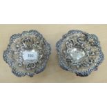 A pair of late Victorian silver sweet dish with pierced ribbon and C-scrolled ornament  London 1897