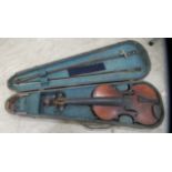 A 19thC violin with a two-piece 14" back  bears an indistinct label  cased; with two bows