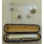 Items of personal ornament: to include a 9ct gold cluster ring; and another  stamped 18kt