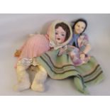 Two dolls, viz. a Norah Wellings handmade fabric example  21"L; and a Heubach Koppelsdorf of Germany