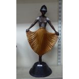 A modern Art Deco style patinated cast metal figure, a dancer  21"h