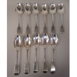 Eleven 19thC silver fiddle pattern dessert spoons  mixed marks