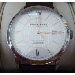 A Baume & Mercier stainless steel cased automatic wristwatch, faced by a Roman and baton dial with a