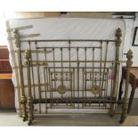 A late Victorian lacquered brass double bed frame with pillar uprights  66"w with an Orthopure