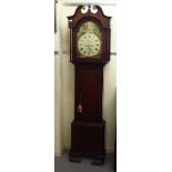 An early 19thC mahogany longcase clock, having a swan neck pediment, flank pillars and an arched