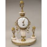 A late 19thC Continental gilt metal and white alabaster pillar type mantel timepiece; the drum cased