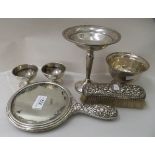 Silver and white metal collectables: to include a dressing table hand mirror, elaborately