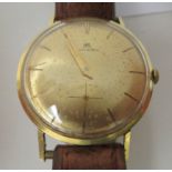 A vintage Bucherer yellow metal cased wristwatch, faced by a baton dial, incorporating a subsidiary,
