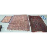Rugs: to include a Kilim examples with floral motifs, on a red and blue ground  37" x 29"