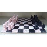 A marble chess set  the board 11"sq
