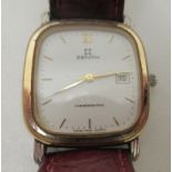 A Zenith gold plated stainless steel cased composition wristwatch, faced by a baton dial with a date