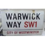 A red and black on white steel enamel road sign 'Warwick Way, SW1, City of Westminster'  17" x 28"