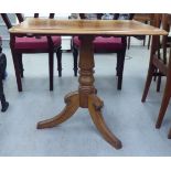 A 19thC mahogany pedestal table, over a ring turned column, raised on a splayed tripod base  27"h