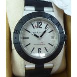 A Bulgari aluminium and black rubber cased strapped wristwatch, faced by an Arabic and baton dial,
