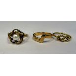 Three 9ct gold rings: to include one set with a seed pearl
