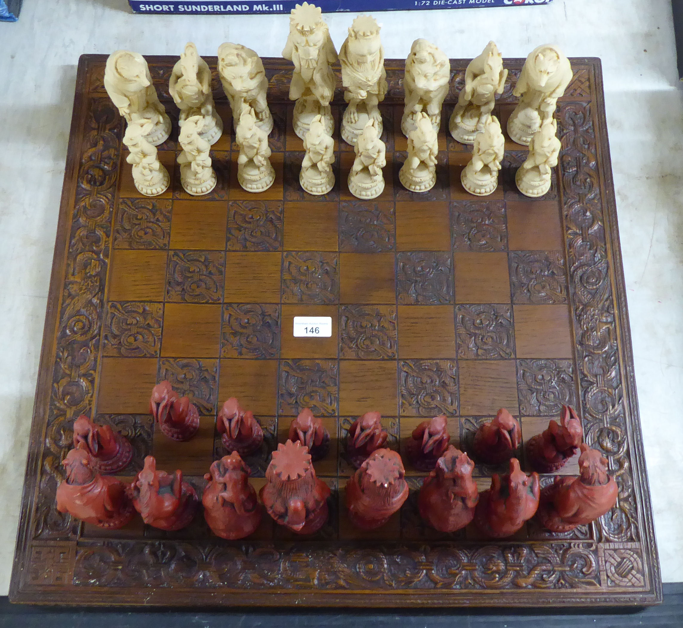 A novelty resin chess set, the board 23.5"sq - Image 2 of 3
